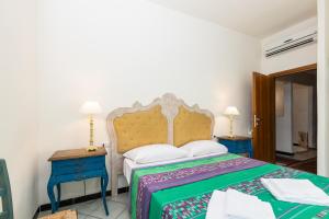 Postel nebo postele na pokoji v ubytování Helios Hotel