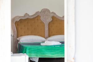 Postel nebo postele na pokoji v ubytování Helios Hotel