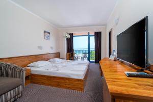TV a/nebo společenská místnost v ubytování MPM Hotel Condor - All Inclusive Light