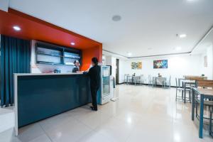 Kuchyň nebo kuchyňský kout v ubytování Travelbee Business Inn + 9 fotografií