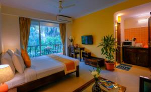 Voodi või voodid majutusasutuse TreeHouse Blue Hotel & Serviced Apartments toas