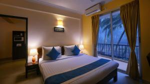 Voodi või voodid majutusasutuse TreeHouse Blue Hotel & Serviced Apartments toas