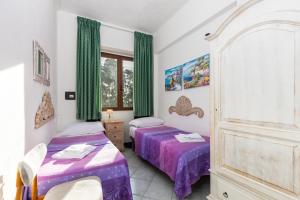 Postel nebo postele na pokoji v ubytování Helios Hotel