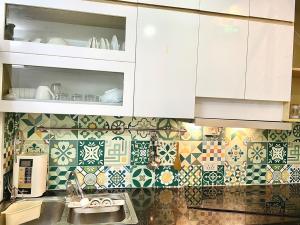 Kuchyň nebo kuchyňský kout v ubytování Hidden Paradise Apartment- 3 bedrooms -3 floors + 72 fotografií