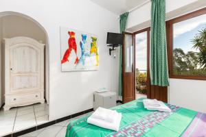 Postel nebo postele na pokoji v ubytování Helios Hotel