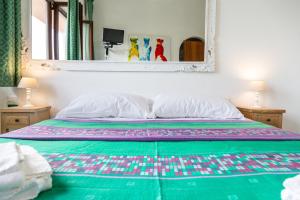 Postel nebo postele na pokoji v ubytování Helios Hotel