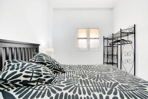 Postel nebo postele na pokoji v ubytování Cia Molina