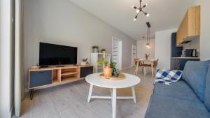 Telewizja i/lub zestaw kina domowego w obiekcie Baltic Nova, Sun & Snow