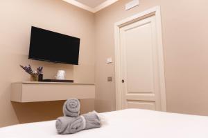 Postel nebo postele na pokoji v ubytování Ayma B&B