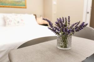 Postel nebo postele na pokoji v ubytování Ayma B&B