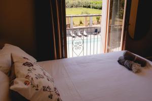 Postel nebo postele na pokoji v ubytování Ayma B&B