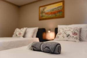 Postel nebo postele na pokoji v ubytování Ayma B&B