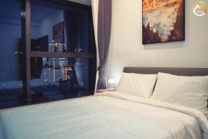 Postel nebo postele na pokoji v ubytování Hotel Serviced Apartments Top One Infinity Pool with View of 360 Degree