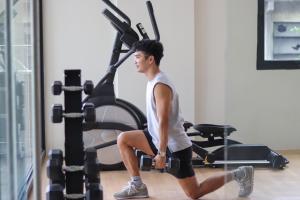 Centrul de fitness și/sau facilități de fitness de la The Grid Co-Living Managed by HII