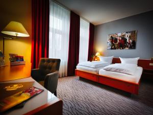 Voodi või voodid majutusasutuse Hotel Kaiserhof toas