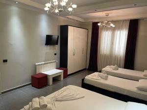 Postel nebo postele na pokoji v ubytování Hotel Erandi