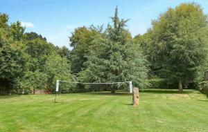 a goal in the middle of a field with trees at Beautiful Home In Plouha With Wifi in Plouha