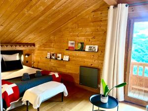 Postel nebo postele na pokoji v ubytování Le Paret chambres d'hôtes de charme & spa