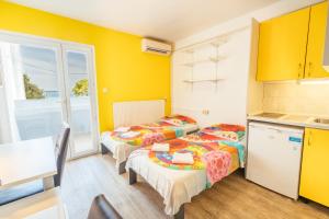 Postel nebo postele na pokoji v ubytování ŠD Portorož Hostel Korotan