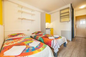 Postel nebo postele na pokoji v ubytování ŠD Portorož Hostel Korotan