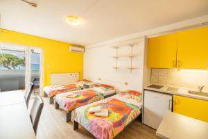 Postel nebo postele na pokoji v ubytování ŠD Portorož Hostel Korotan