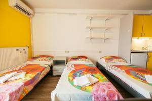 Postel nebo postele na pokoji v ubytování ŠD Portorož Hostel Korotan