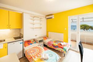 Postel nebo postele na pokoji v ubytování ŠD Portorož Hostel Korotan