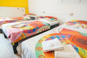 Postel nebo postele na pokoji v ubytování ŠD Portorož Hostel Korotan