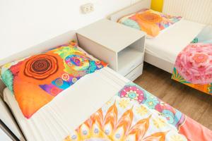 Postel nebo postele na pokoji v ubytování ŠD Portorož Hostel Korotan