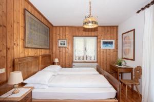 Postel nebo postele na pokoji v ubytování B&B Villa La Bercia