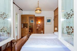 Postel nebo postele na pokoji v ubytování B&B Villa La Bercia