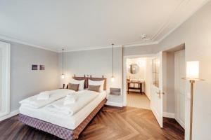 Postel nebo postele na pokoji v ubytování Boutique Hotel das TSCHOFEN