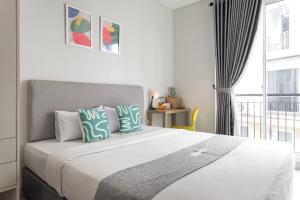 Postel nebo postele na pokoji v ubytování Mono Coliving at BSD City