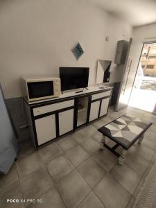 Μια τηλεόραση ή/και κέντρο ψυχαγωγίας στο Estancia Rápida