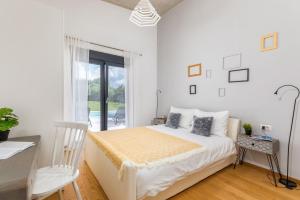 Ένα ή περισσότερα κρεβάτια σε δωμάτιο στο Villa Sama +30 φωτογραφίες