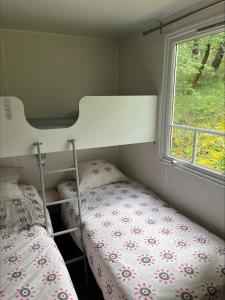 Camping La Tuque客房内的一张或多张床位