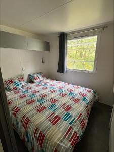 Camping La Tuque客房内的一张或多张床位