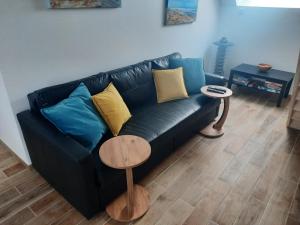 Posezení v ubytování Duplex avec vue sur mer-La Rose des Vents