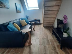 Posezení v ubytování Duplex avec vue sur mer-La Rose des Vents