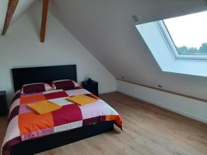 Postel nebo postele na pokoji v ubytování Duplex avec vue sur mer-La Rose des Vents