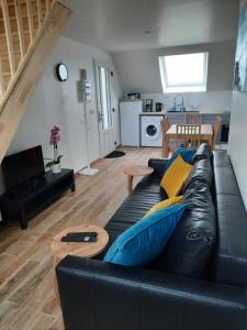 Posezení v ubytování Duplex avec vue sur mer-La Rose des Vents