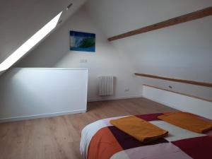 Postel nebo postele na pokoji v ubytování Duplex avec vue sur mer-La Rose des Vents