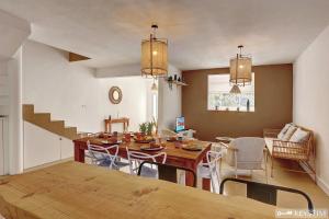 a kitchen and dining room with a table and chairs at Villa Haven - Piscine - Grand-Bois in Saint-Pierre