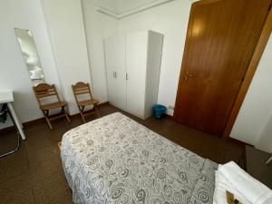 Postel nebo postele na pokoji v ubytování Como City Life