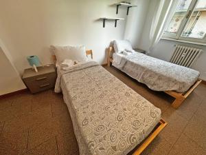 Postel nebo postele na pokoji v ubytování Como City Life