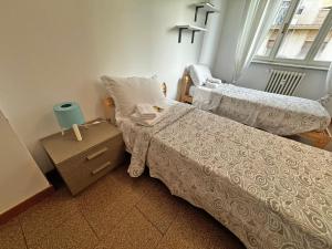 Postel nebo postele na pokoji v ubytování Como City Life