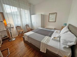 Postel nebo postele na pokoji v ubytování Como City Life