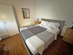 Postel nebo postele na pokoji v ubytování Como City Life + 13 fotografií