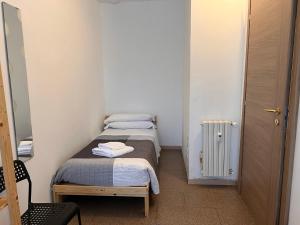 Postel nebo postele na pokoji v ubytování Como City Life