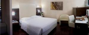 Posteľ alebo postele v izbe v ubytovaní Hotel Habitat